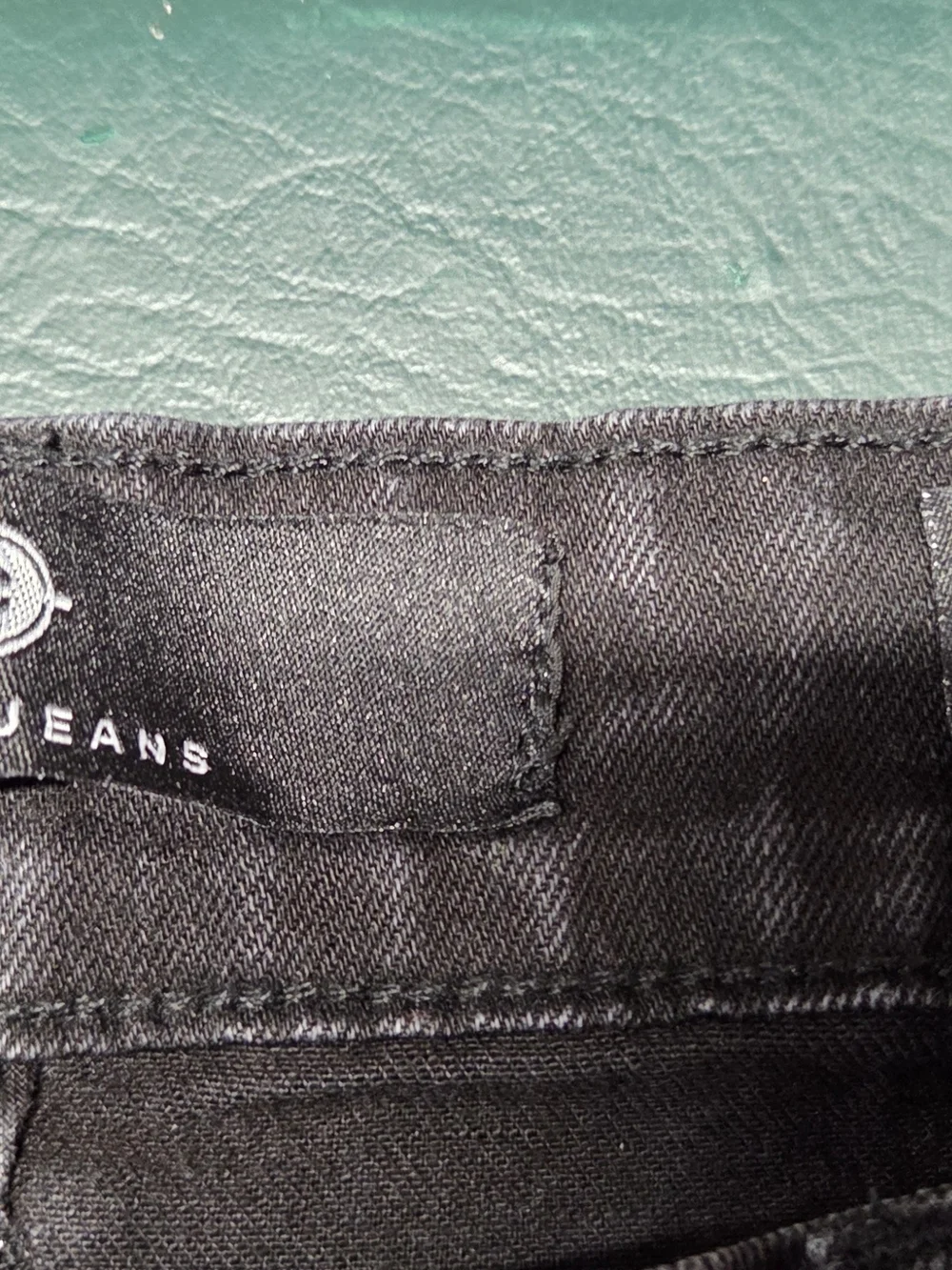 **Black Distressed Men’s Jeans with Color Patch Accents** - Picture 10 of 14